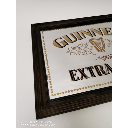 177 - Guinness Extra Stout advertising mirror. { 48cm H X 64cm W }.