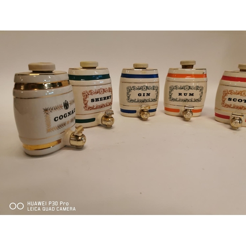 359 - Set of five ceramic spirit barrels.   -  Cognac, Sherry, Gin, Rum and Scotch. { 12cm H X 9cm W X 10c... 