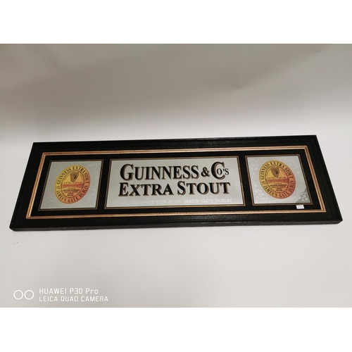 361 - Guinness & Co Extra Stout advertising mirror. {54cm H X 170cm W }.