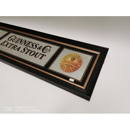 361 - Guinness & Co Extra Stout advertising mirror. {54cm H X 170cm W }.