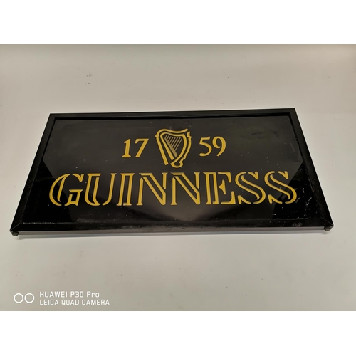 364 - 1759 Guinness advertisement on glass. {34cm H X 63cm W }.