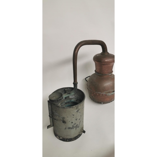 63 - 19th. C. copper whiskey still.  { 48cm H X 60cm W X 30cm D }.