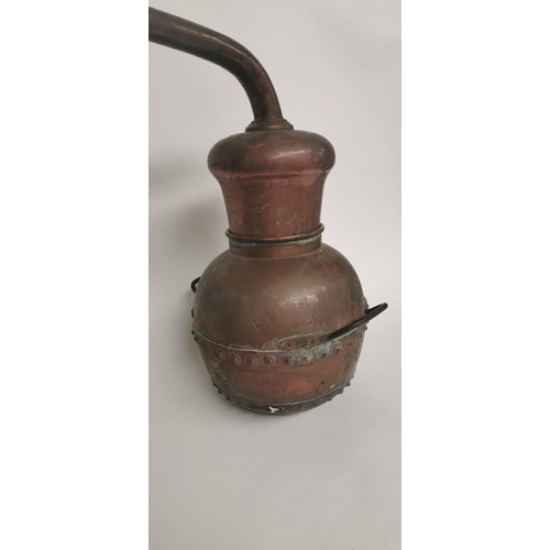 63 - 19th. C. copper whiskey still.  { 48cm H X 60cm W X 30cm D }.