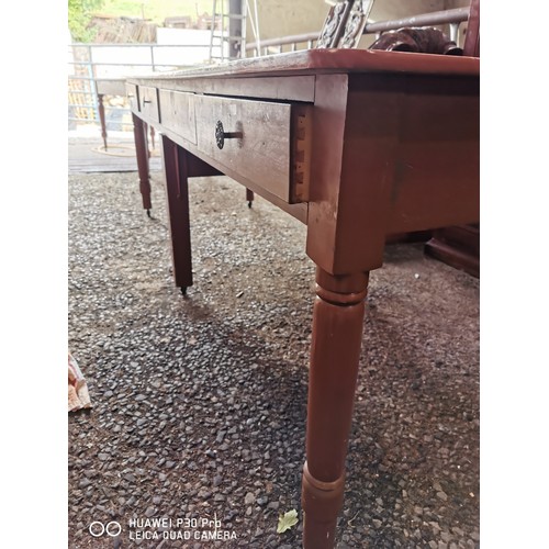 147 - 19th. C. painted pine table with eight drawers on turned legs. (82 cm H x 243 cm L x 83 cm D)