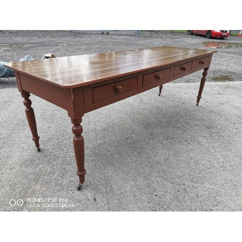 72 - 19th. C. painted pine table with eight drawers on turned legs