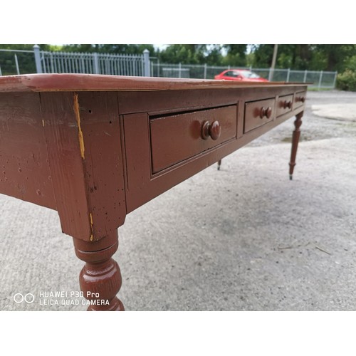 72 - 19th. C. painted pine table with eight drawers on turned legs