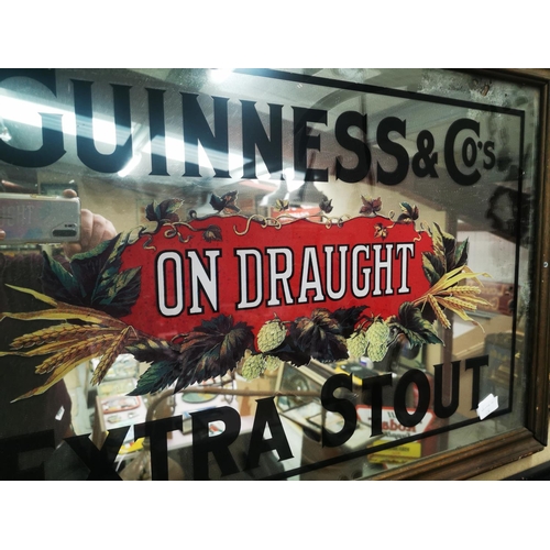 1022 - Guinness & Co's on Draught Extra Stout framed advertising mirror {59 cm H x 85 cm W}.