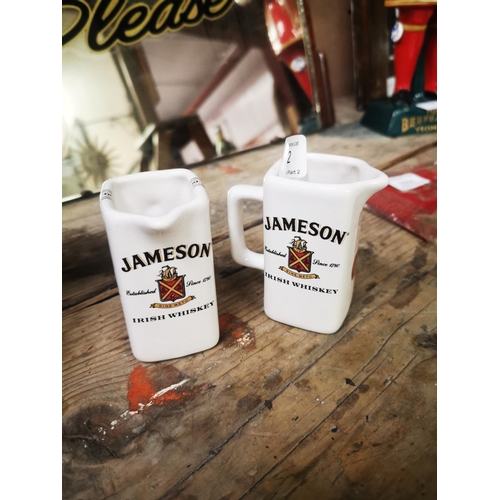 1032 - Two miniture Jameson Whiskey advertising jugs {8 cm H}.