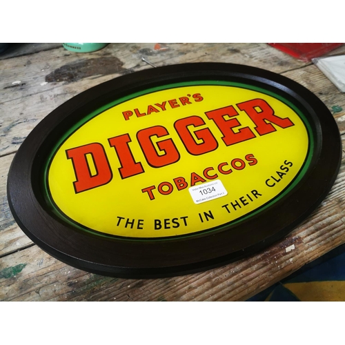 1034 - Player's Digger Tobacco reverse paited glass framed advertising sign {29 cm H x 40 cm W}.