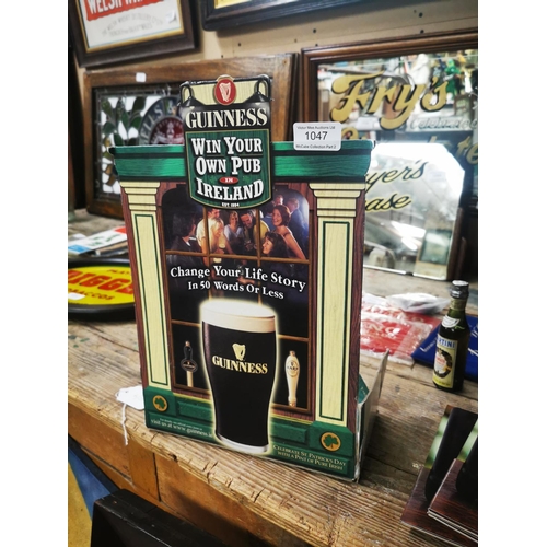 1047 - Guinness Win Your Own Pub advertising showcard {37 cm H x 24 cm W}.