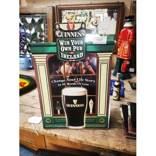 1047 - Guinness Win Your Own Pub advertising showcard {37 cm H x 24 cm W}.