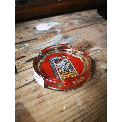 1048 - Wild Woodbine Cigarettes glass advertising ashtray.