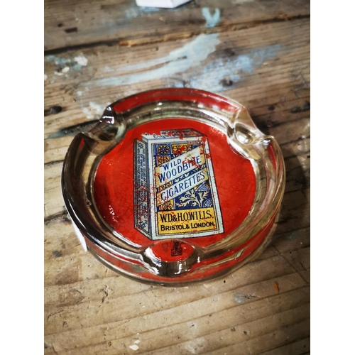 1048 - Wild Woodbine Cigarettes glass advertising ashtray.