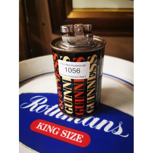 1056 - Guinness Cigarette Lighter in the form of a advertising can {12 cm H}