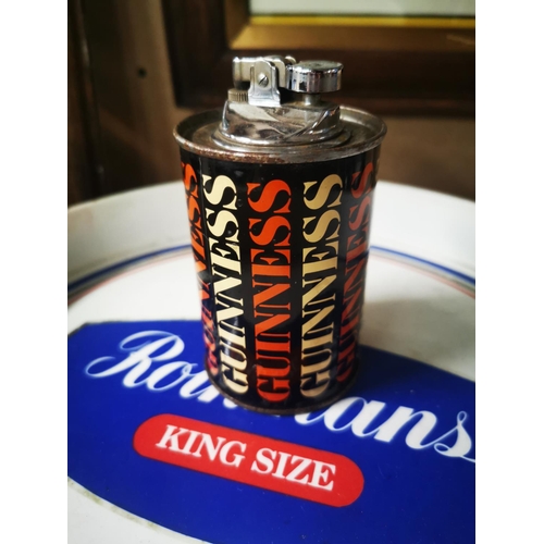 1056 - Guinness Cigarette Lighter in the form of a advertising can {12 cm H}