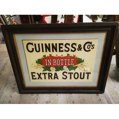 1072 - Guinness In Bottle Extra Stout framed advertising print {65 cm H x 84 cm W}.