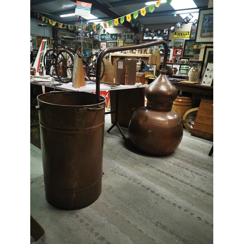 1083 - Good quality Irish copper whiskey still {131 cm H x 182 cm W}.