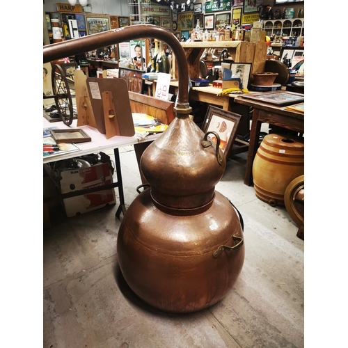 1083 - Good quality Irish copper whiskey still {131 cm H x 182 cm W}.