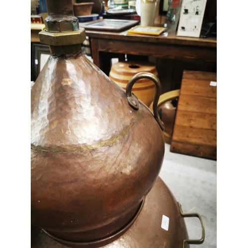 1083 - Good quality Irish copper whiskey still {131 cm H x 182 cm W}.