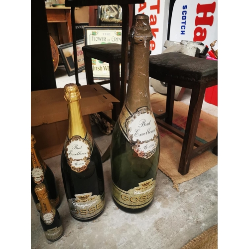 1089 - Set of six graduating Gosset display champagne bottles {Largest 67 cm H and Smallest 23cm H}.