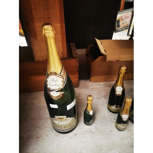 1089 - Set of six graduating Gosset display champagne bottles {Largest 67 cm H and Smallest 23cm H}.