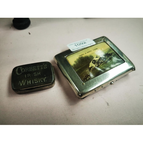 1092 - Corbett's Irish Whisky match stirke and Buchanan's Black & White Whisk cigarette case.