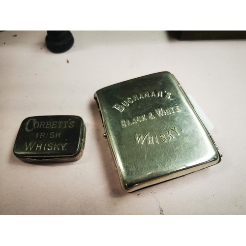 1092 - Corbett's Irish Whisky match stirke and Buchanan's Black & White Whisk cigarette case.