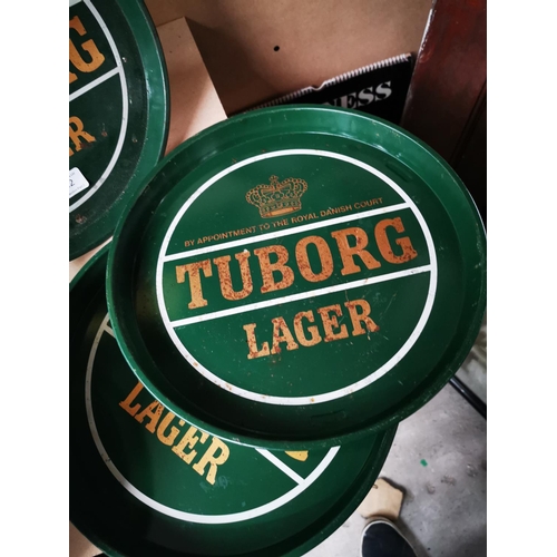 1202 - Three Tuborg Lager tinplate advertising drinks trays {30 cm Dia.}.