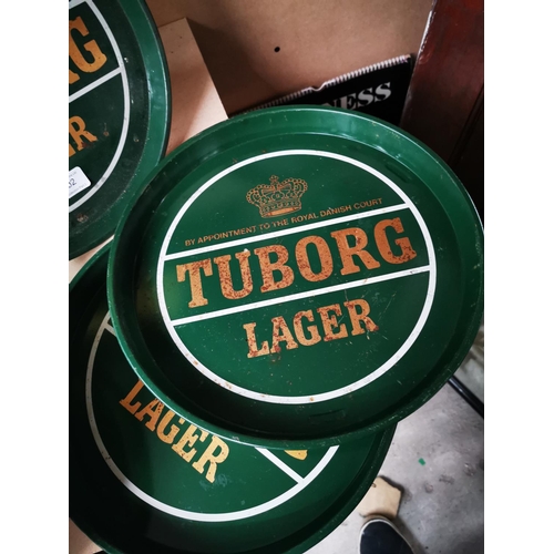 1202 - Three Tuborg Lager tinplate advertising drinks trays {30 cm Dia.}.