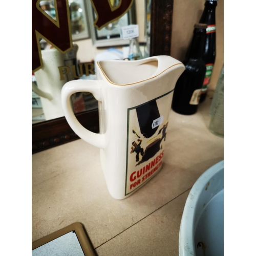 1204 - Guinness For Strength ceramic advertising jug {18 cm H}.