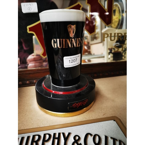 1207 - Guinness light up counter sign in the form of a pint glass {18 cm H}.