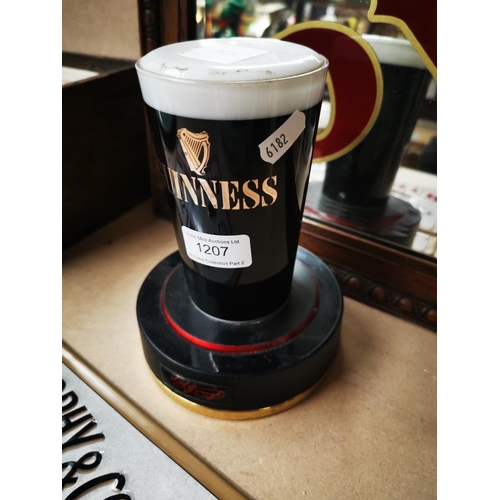 1207 - Guinness light up counter sign in the form of a pint glass {18 cm H}.