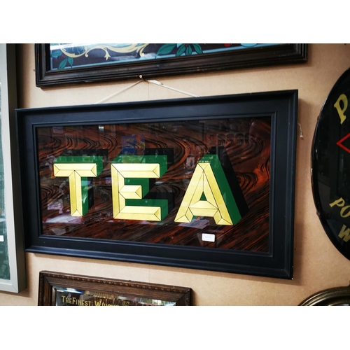 1215 - Tea on glass framed advertising sign {51 cm H x 91 cm W}.