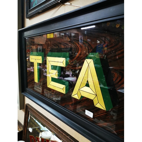 1215 - Tea on glass framed advertising sign {51 cm H x 91 cm W}.