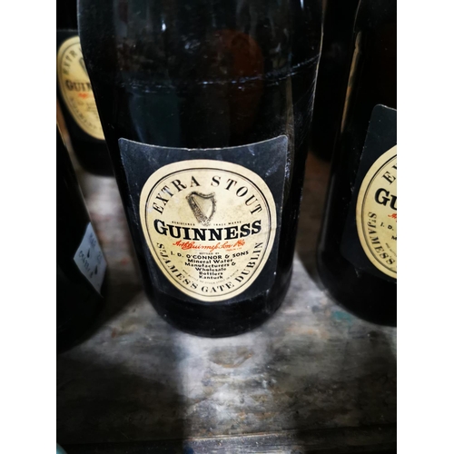 122 - Ten Extra Stout Guinness St James's Gate Dublin bottles by J. D. O' Connor & Sons.