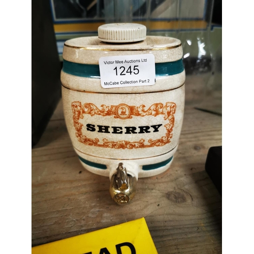 1245 - Miniture ceramic Sherry dispenser {12 cm H}.