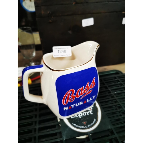 1248 - Wade Bass Naturally advertising water jug.  { 12cm H }.