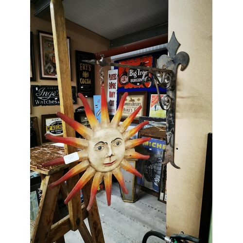 1251 - Sunburst sign on original bracket {40 cm H x 56 cm W}.