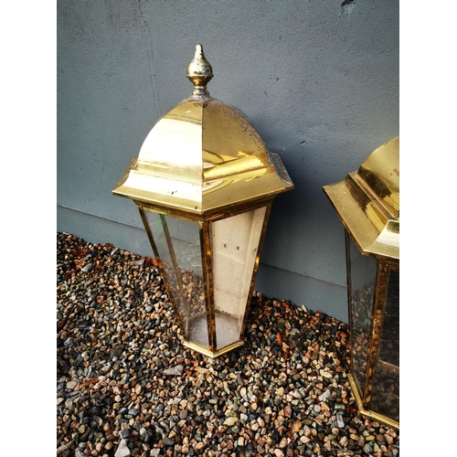 1259 - Three brass pub lanterns {Roughly 101 cm H x 56 cm W}