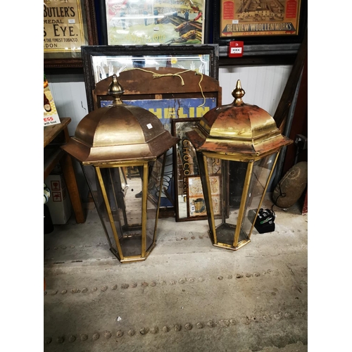 1260 - Two brass pub lanterns {Roughly 101 cm H x 56 cm W}