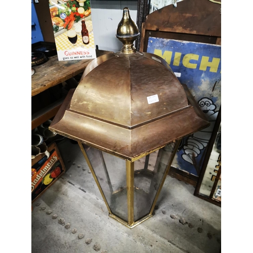 1260 - Two brass pub lanterns {Roughly 101 cm H x 56 cm W}