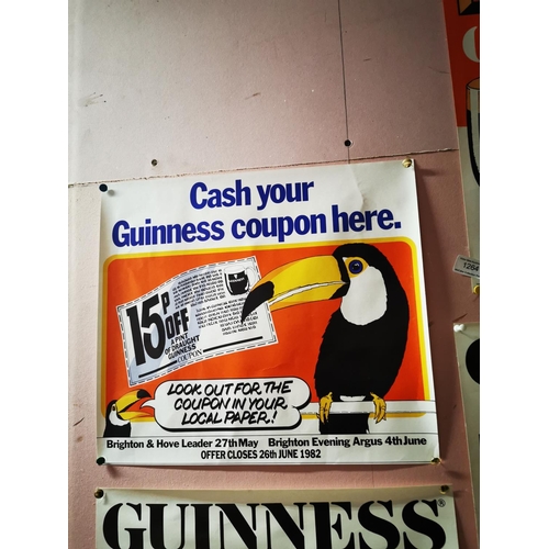 1264 - Two Guinness advertising posters - Free Guinness Glass {51 cm H x 39 cm W} and Cash Your Guinness Co... 