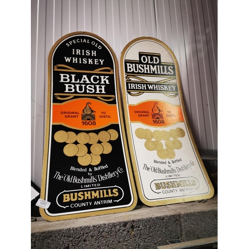 1275 - Two Bushmills Whiskey cardboard advertising signs {78 cm H x 30 cm W}.