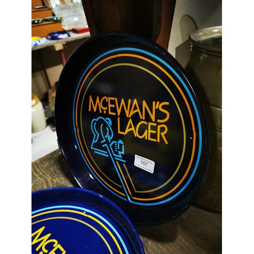 167 - Two McEwan's Lager drink's trays { each 30cm Dia. }.