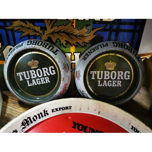 176 - Younger's Monk Express tinplate drink's tray  { 30cm Dia }  and two Tuborg tinplate ashtrays.