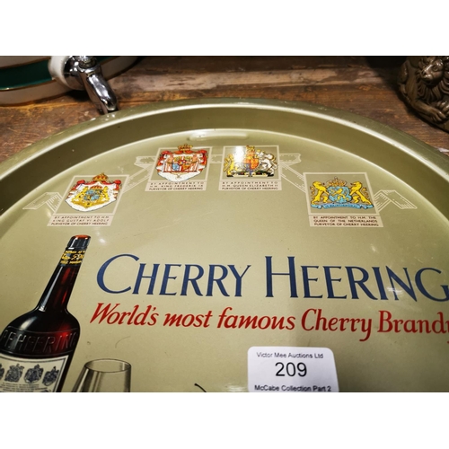 209 - Cherry Heering World's Most Famous Cherry Brandy tinplate drink's tray. { 34cm Dia }.