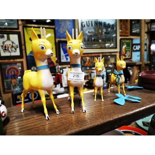 215 - Four Babycham advertising figures.