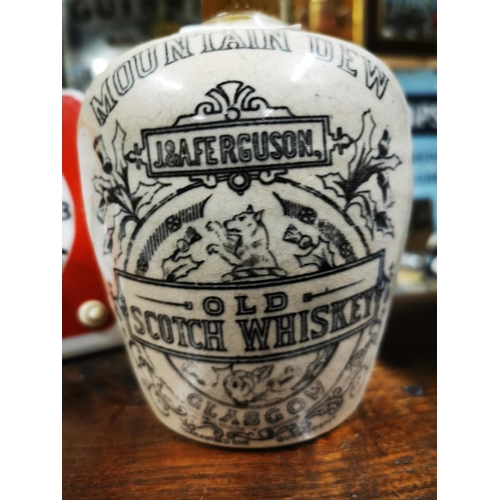 222 - Mountain Dew J & A Ferguson stoneware advertising whiskey flagon  { 19cm H }.