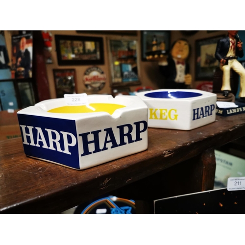 228 - Two Harp ceramic ashtrays