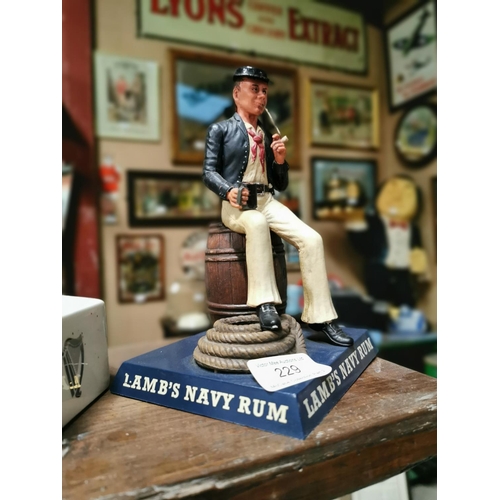 229 - Lamb's Navy Rum advertising figure. { 20cm H X 12cm W }.